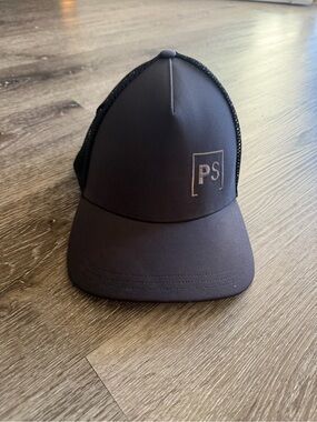 Lulu's Black Mesh Back Trucker Hat with Subtle Logo